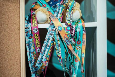 a teddy bear wearing a hat and scarf