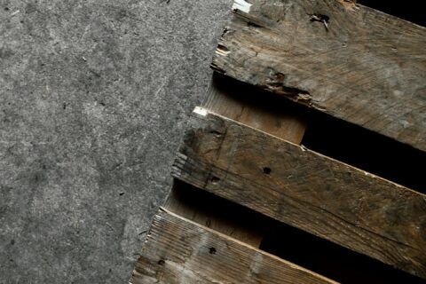 brown wooden pallet on gray concrete floor