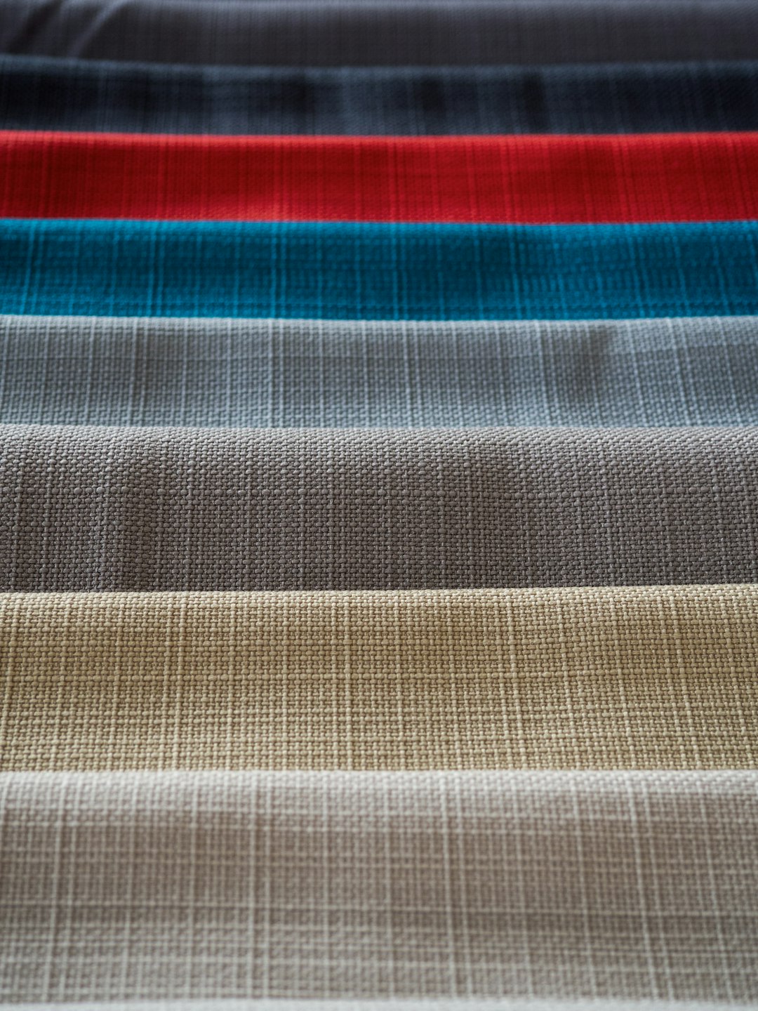 red white and black striped textile